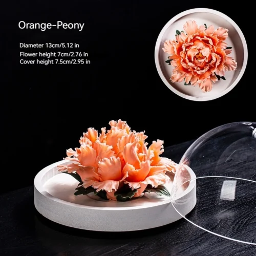 Handmade orange ceramic peony diffuser with glass cover for essential oil diffusion and incense holding.
